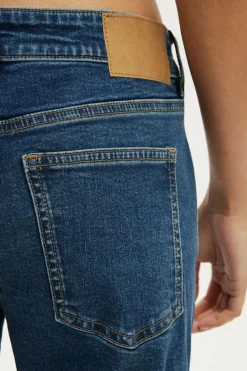 Petite Mid Rise Bootcut Jean